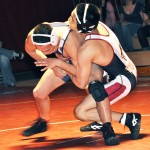 Eagle Jimmy Savala (right), senior of Clovis, Calif., wrestles Thunderwolf Saul Guerrero (left), junior of Fort Lupton, Colo., in the 141-pound bout Saturday, February 12, in the Nelson Physical Activity Center. — Photo by Vera Ulitina