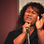Jazzlynn Seumalo, 20, junior of Bremerton Wash., sings “Notice You” by Wiremu Hohaia during High Rise Open Mic Night on Thursday in the Student Center Lounge. — Photo by Kinley Q. Nichols