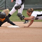 Chadron’s Jamie Mazankowski, senior short stop of Kearney, tags out Sara Palizzi, sophomore outfielder of Thornton, Colo., at second base during the Eagles’ home game Sunday against University of Colorado at Colorado Springs. — Photo by Kinley Q. Nichols