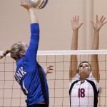 Eagle’s Barbie DeCent, (18), junior right side hitter of Paxton, attempts to block Loper’s Ariel Krolikowski’s, (1), junior outside hitter of Grand Island, on Thursday’s game in Armstrong Gym. The University of Nebraska at Kearney swept the Chadron State College Lady Eagles 25-11, 25-11, 25-16. — Photo by Kinley Q. Nichols