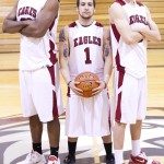 Eagle seniors Moala Tautua, left, of San Francisco, Christian McGhee, center, of Pine Ridge, S.D., and Kevin McClelland, right, of Long Beach, Calif., pose at half court on Tuesday — Photo by Kinley Q. Nichols.