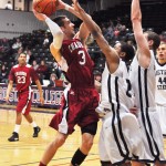 Eagle’s Kevin McClelland, (3), senior guard of Long Beach, Calif., attempts to shoot over his opponent during Friday night’s game at the Auraria Event Center in Denver against Metropolitan State College — Photo courtesy of Metro State College Sports Information.