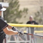 CSC’s Stephanie Townsend, (11), senior pitcher of Roosevelt, Utah, hits the ball during Wednesday’s double-header against Black Hills State University. &mdash; Photo by Kinley Q. Nichols