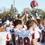 Chadron State Eagles celebrate their win against New Mexico Highlands University on Saturday. Eagles won 36-33 and are now seated in second place in the RMAC standings. — Photo by Mike Ratcliff