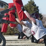 Chadron State’s offensive linemen practice drills Wednesday evening on the practice field. CSC’s spring ball started on Monday after weeks of winter conditioning. — Photo by Ashley Swanson